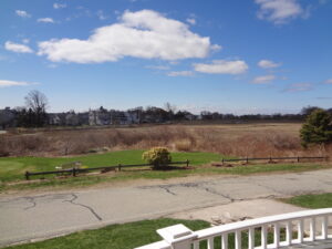 A view of a field from the porch.