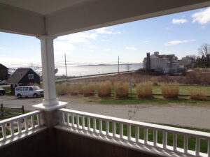 A view of the ocean from an open porch.