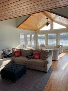 A living room with couches and chairs in it