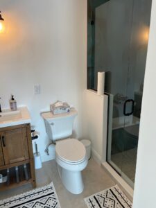 A bathroom with a toilet and sink in it