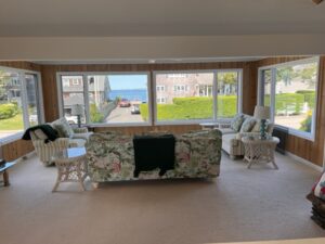 A living room with couches and chairs in it