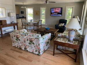 A living room with two couches and a table